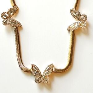Rhinestone Butterflies On a Gold Herringbone Necklace
